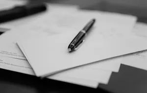Pen resting on estate-planning documents