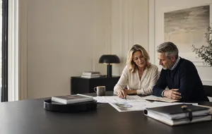 Married couple reviewing estate-planning documents representing South Dakota spousal trust planning